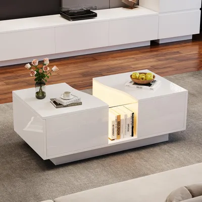 A modern white coffee table with LED lighting, placed in a living room setting.