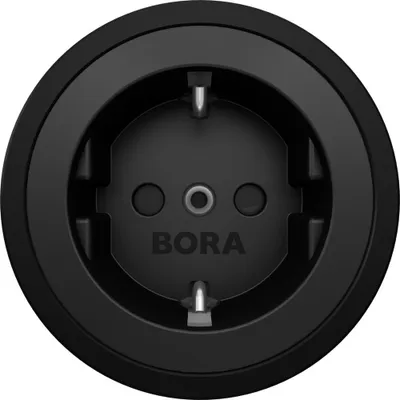 A close-up, studio shot of a black electrical socket.
