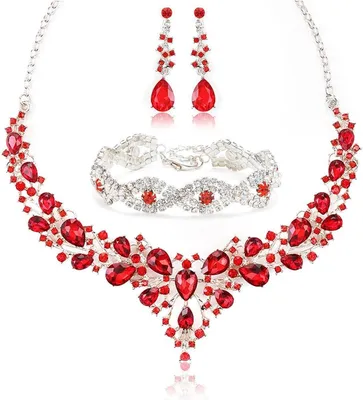 Image de Ensemble de bijoux de mariée comprenant des cristaux et des strass, avec un collier, un bracelet et des boucles d'oreilles, idéal pour les mariages