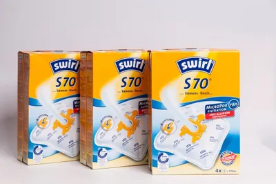 Three boxes of Swirl S70 vacuum cleaner bags are displayed side-by-side against a white background.