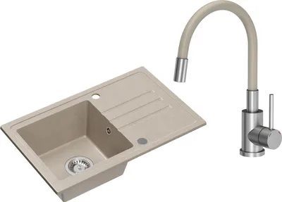 A kitchen sink and faucet set against a white background.