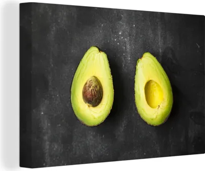 Produktbild von OneMillionCanvasses® - Leinwandbilder - 140x90 cm, Avocadohälften auf einem Tisch, Wandbilder Kunstdruck Wanddekoration - Foto auf Leinwand - Gemälde auf Holzrahmen