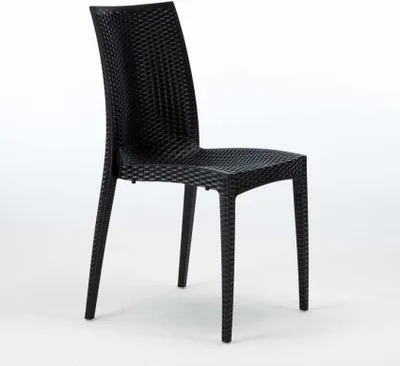 A black poly rattan chair is shown against a white background.