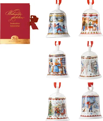 A collection of six decorative Christmas bells and a red gift box.