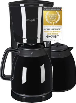 A black filter coffee machine with a thermos carafe and a German customer award badge.
