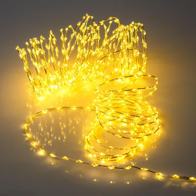 Imagen del producto de Cadena de luces cálidas y blancas, extra densa, con temporizador y funciones. 756 LEDs. Cable de luz plateado de 12 metros, apto para interiores y exteriores, con enchufe de red