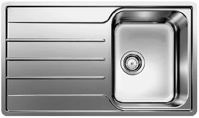 A top-down view of a stainless steel kitchen sink with a single basin and a draining board.