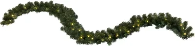 A green garland with small yellow lights on a white background.