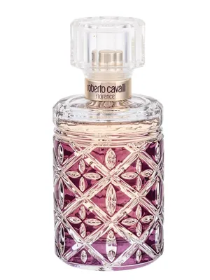 A perfume bottle with a clear glass cap and a patterned purple and clear glass body.