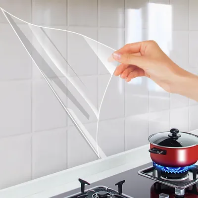 Produktbild von Transparente Wandschutzfolie — Statisch haftend, klebstofffrei, öl- & wasserfest (Ideal für Küchenrückwände) — Vinyl-Wandschutzfolie — Ablösbare, hitzebeständige transparente Wandfolie (Geeignet für Schränke, Möbel und Türen)