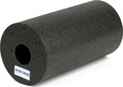 A black foam roller with text and a logo on the end cap.