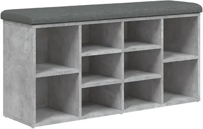 Imagen del producto de Zapatero de 102x32x50 cm, fabricado en madera, color gris cemento. Estantería con asiento y cojín