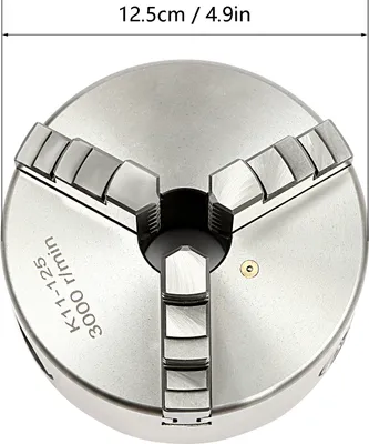 A three-jaw chuck for a lathe, with dimensions indicated.