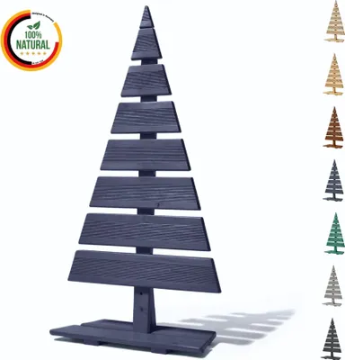 A dark blue decorative Christmas tree with a base, shown against a white background, with a circular overlay in the top left corner and a row of colored Christmas trees on the right.