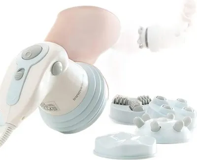 A close-up shot of an anti-cellulite massager with several attachments.