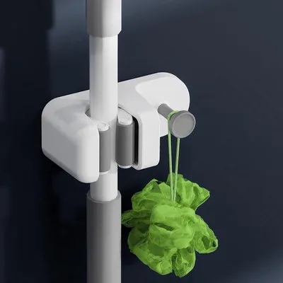 Immagine prodotto di Organizer da parete per ferri da stiro e articoli per la casa, ideale per cucina, garage e giardino.