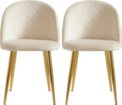Two beige upholstered dining chairs with gold metal legs are shown against a white background.
