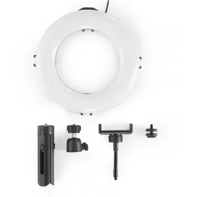 A white ring light and its accessories are laid out on a white background.