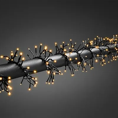 Lumineo Guirlande Lumineuse Cluster Blanc Chaud - 3000 LED - 28 M - Câble Transparent - Pour L'intérieur Et L'extérieur - Intensité Variable - Minuterie - Transformateur Extérieur