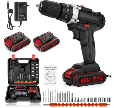 A cordless drill set with accessories, batteries, and a charger, laid out against a white background.