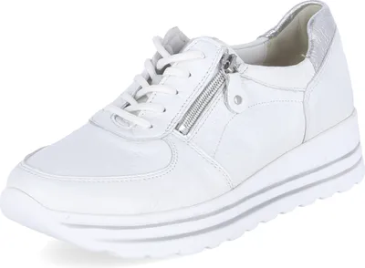 A white sneaker with silver accents is shown against a white background.