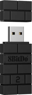 A black 8BitDo Wireless Bluetooth Adapter 2 is shown against a white background. The adapter is designed to resemble building blocks.