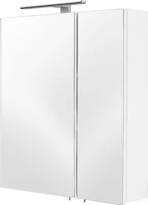 A modern medicine cabinet with a light fixture.