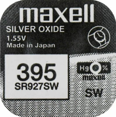 A close-up of a Maxell SR0927SW 395 1.55V silver oxide button cell battery label.