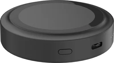 A black wireless charging power bank is shown from a side angle against a white background.