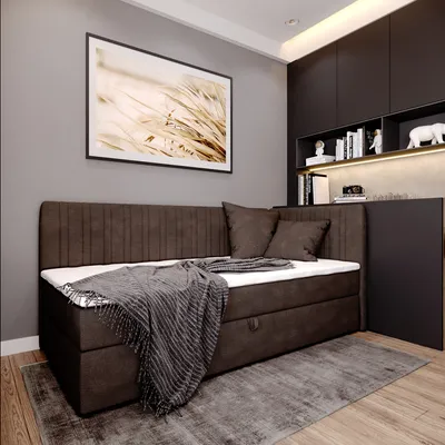 A bedroom setting with a bed and storage units.