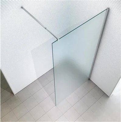 A corner of a modern bathroom with a glass shower screen.
