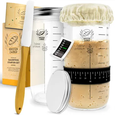 A sourdough starter kit with two fermentation jars, a spatula, and a thermometer.