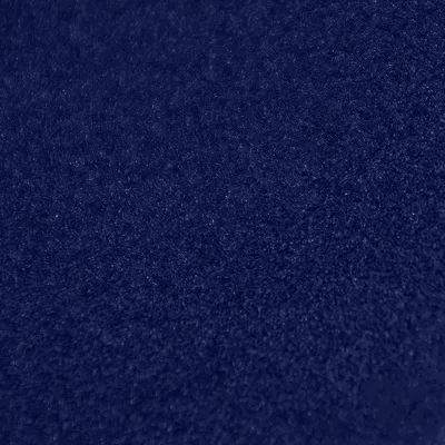 Close-up of a dark blue textured fabric.