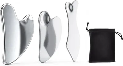 Produktbild von Gua Sha Set: 3-teiliges Edelstahl-Set zum Gua Sha Schaben und Massieren. Geeignet für Gesicht, Hals, Körper und Augen. Inklusive Massage- und Muskel-Schaber. Guasha-Stein