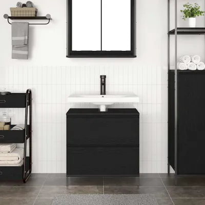 A modern bathroom with a black vanity, sink, faucet, and shelving unit.