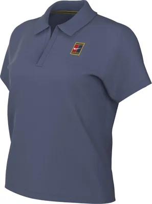 Productafbeelding van NIKE Dames Tenniskleding, cropped polo shirt, model NKCT HRTG SS, kleur: gedempt blauw, maat M
