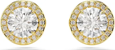 A pair of gold stud earrings with clear stones, set against a white background.