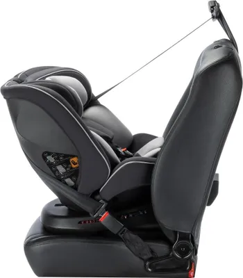 A side view of a black and gray car seat, secured to a car seat with a strap.