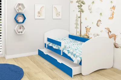 A child's bedroom with a bed and wall decorations.