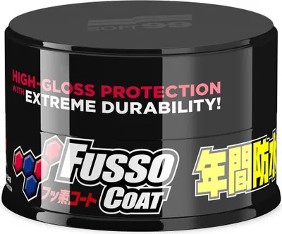 A black cylindrical container of car wax with prominent branding and text.