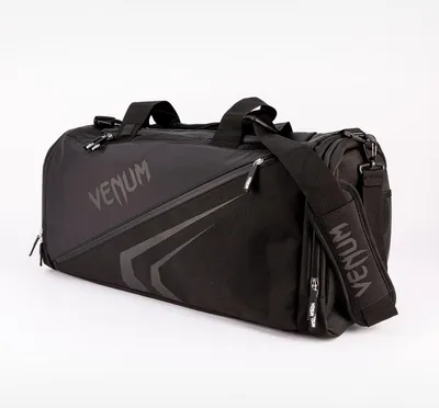 A black Venum duffel bag is shown against a white background.
