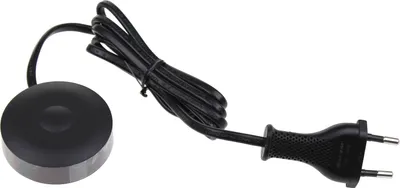 A black power adapter with a European plug and a round base unit.
