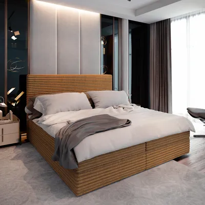 A bedroom scene featuring a bed with bedding and a headboard.