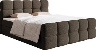 A brown upholstered bed with a white duvet and pillows, shown from a side angle against a white background.