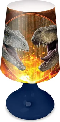 A close-up of a dinosaur-themed table lamp with a blue base.