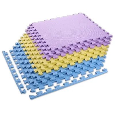 A stack of interlocking foam puzzle mats in purple, yellow, and blue.