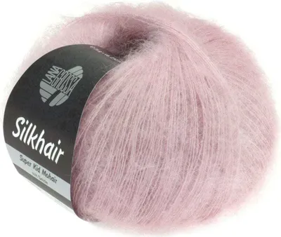 A ball of pink yarn with a black label.