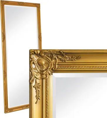 Two ornate gold-framed mirrors are shown against a white background. One mirror is in the foreground, with a close-up view of its decorative corner. The second mirror is in the background, slightly out of focus and angled.