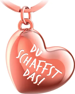 A rose gold heart-shaped pendant with engraved text.