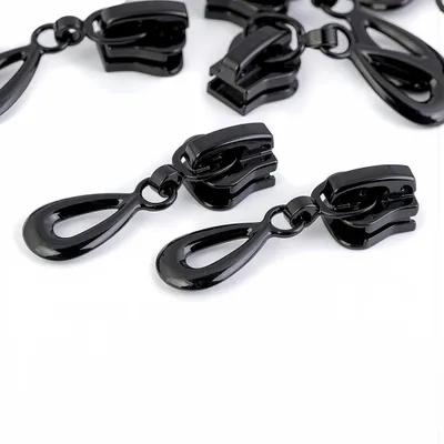 10 Reißverschlussschieber 5mm Tropfenform in Schwarz glänzend.